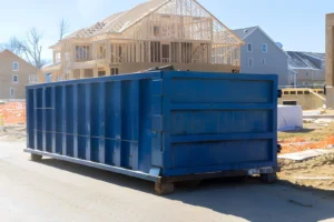 Roll off dumpster rental in East Idaho placed in a driveway for a home cleanout